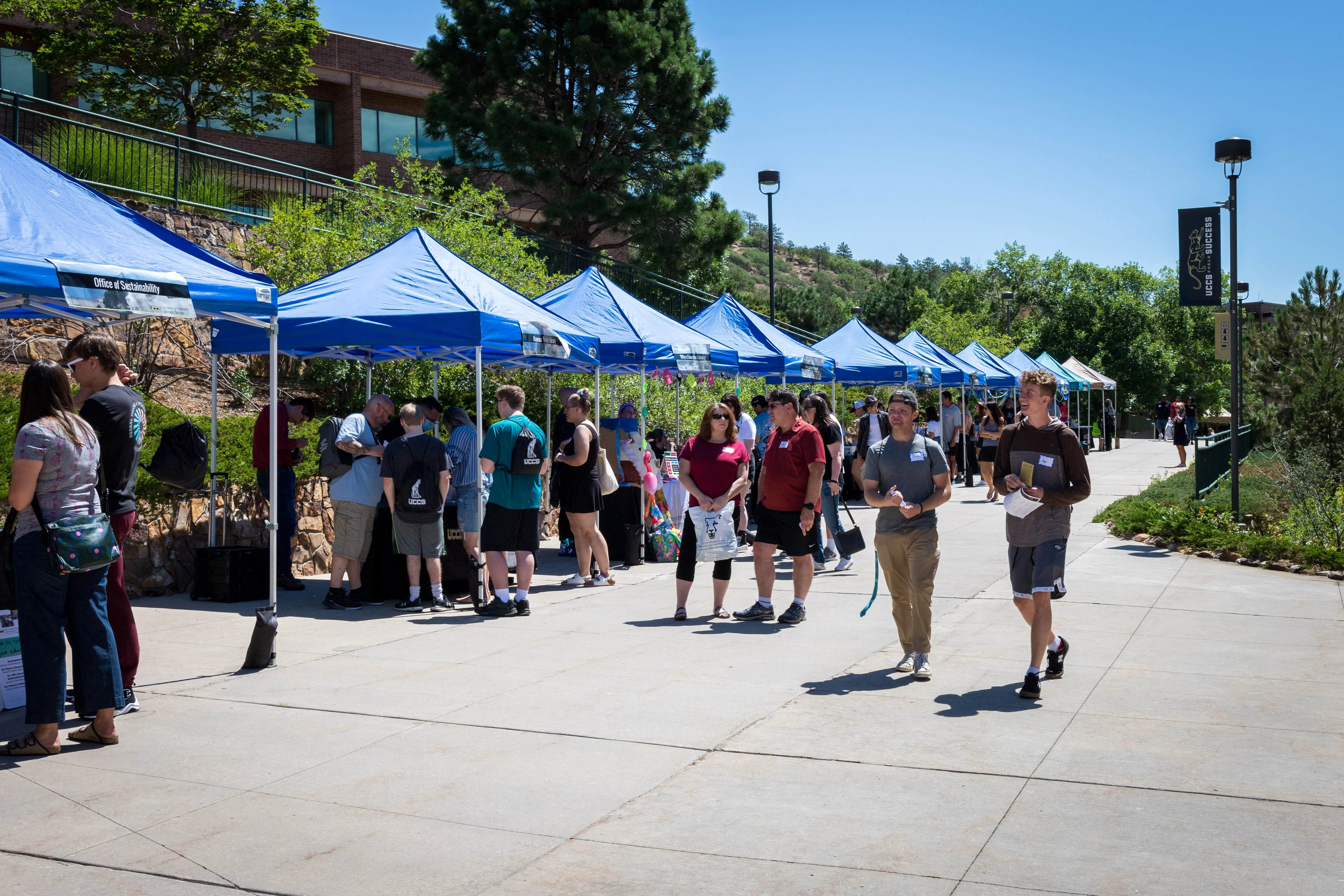 Tents and tables at a Welcome Bash